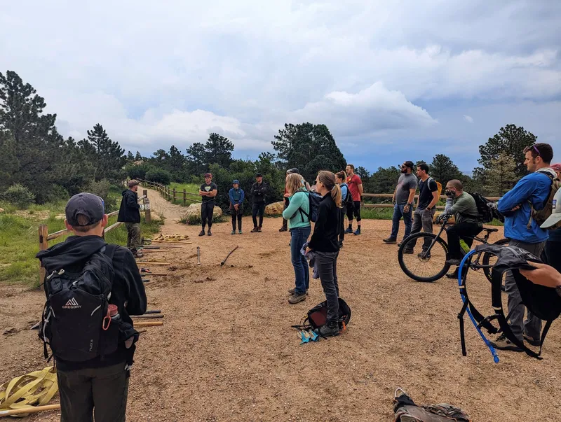 Volunteers gather on a Ute Valley Park trail